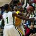 Ypsilanti High School junior Jacob Simmons is heavily defended by Huron players in the game on Friday, March 8. Daniel Brenner I AnnArbor.com